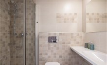 GRAND - Doksy - Koupelna se sprchou v Hotel GRAND